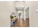 Welcoming foyer with high ceilings, hardwood floors, and natural light filtering through the home at 4228 Nc 42 Hwy, Raleigh, NC 27603