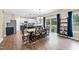 Open-concept kitchen and dining area with modern appliances and a cozy dining table at 4228 Nc 42 Hwy, Raleigh, NC 27603