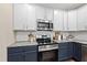 Well-equipped kitchen with stainless steel appliances, and stone countertops at 4228 Nc 42 Hwy, Raleigh, NC 27603