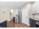 Bright eat-in kitchen with stainless steel appliances, granite countertops, and stylish cabinets at 4228 Nc 42 Hwy, Raleigh, NC 27603