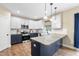 Stylish kitchen with stainless steel appliances, granite counters, and shaker cabinets at 4228 Nc 42 Hwy, Raleigh, NC 27603