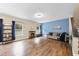 Spacious living room features hardwood floors, cozy fireplace, and plenty of room for entertaining at 4228 Nc 42 Hwy, Raleigh, NC 27603