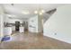 Spacious open-concept kitchen featuring a center island, stainless steel appliances, and easy access to the dining area at 4817 Quarryman Rd, Raleigh, NC 27610