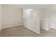 Carpeted loft area or bonus room with neutral walls, offering flexible space for a variety of uses at 4817 Quarryman Rd, Raleigh, NC 27610