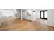 Wide view of finished basement with fireplace, stairs and sink area at 4902 Brookhaven Dr, Raleigh, NC 27612