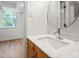 Bathroom featuring a vanity with marble countertop at 4902 Brookhaven Dr, Raleigh, NC 27612