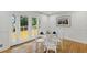 Cozy dining area with bright light and access to the outdoor deck at 4902 Brookhaven Dr, Raleigh, NC 27612