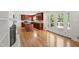 Kitchen view highlighting the dark wood cabinetry, island, and hardwood flooring at 4902 Brookhaven Dr, Raleigh, NC 27612