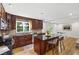 Spacious kitchen with granite countertops, island with seating, and stainless steel appliances at 4902 Brookhaven Dr, Raleigh, NC 27612
