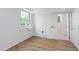 Bright laundry room with a large window, essential utility connections, and easy access to the rest of the home at 4902 Brookhaven Dr, Raleigh, NC 27612
