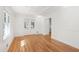 Bright living room with hardwood floors, recessed lights, coffered ceilings, and an abundance of natural light at 4902 Brookhaven Dr, Raleigh, NC 27612