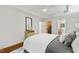Spacious main bedroom offering a closet and a dressing table with mirror at 4902 Brookhaven Dr, Raleigh, NC 27612