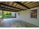 Covered patio offering ample space for outdoor activities at 4902 Brookhaven Dr, Raleigh, NC 27612