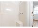 Shower stall with a built-in seat and clear shower knobs at 4902 Brookhaven Dr, Raleigh, NC 27612