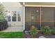 Covered screened porch offers a peaceful retreat with a view of the backyard at 4924 Amber Clay Ln, Raleigh, NC 27612