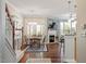 Bright dining area featuring a fireplace and views of the backyard at 4924 Amber Clay Ln, Raleigh, NC 27612