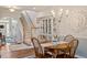 Inviting dining area adjacent to the staircase and living spaces at 4924 Amber Clay Ln, Raleigh, NC 27612