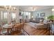 Open-concept living area featuring a fireplace and ample seating at 4924 Amber Clay Ln, Raleigh, NC 27612