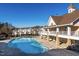 Large outdoor pool, perfect for relaxing or swimming laps, with a nearby clubhouse at 4924 Amber Clay Ln, Raleigh, NC 27612