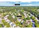 An aerial view shows the neighborhood location near Hope Valley CC, surrounded by lush greenery and residential homes at 5016 Silhouette Dr, Durham, NC 27713
