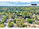 An aerial view of a lovely neighborhood with many mature trees and landscaping at 5016 Silhouette Dr, Durham, NC 27713