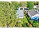 An aerial view of the property showcasing the roof and landscaped yard at 5016 Silhouette Dr, Durham, NC 27713