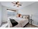 Comfortable bedroom with a large window, neutral carpet and light gray walls at 5016 Silhouette Dr, Durham, NC 27713