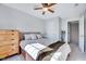 Bright bedroom featuring natural light, wood dresser, and neutral carpet at 5016 Silhouette Dr, Durham, NC 27713