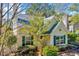 Well maintained home with lush greenery surrounding the property, offering a private and serene setting at 5016 Silhouette Dr, Durham, NC 27713
