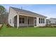 Screened-in porch area provides a relaxing outdoor space and complements the home's facade at 502 Gainer Dr # 2, Raleigh, NC 27610