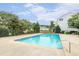 Enjoy this beautiful community pool surrounded by lush landscaping and relaxing poolside amenities at 5110 Neuse Commons Ln # 109, Raleigh, NC 27616