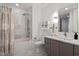 Modern bathroom featuring a luxurious shower-tub combo, toilet, and sleek vanity with contemporary finishes at 523 S West St # 404, Raleigh, NC 27601