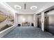 Elevator lobby with modern fixtures, including carpeting, artwork and lighting at 523 S West St # 404, Raleigh, NC 27601