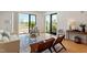 Bright living room with hardwood floors, city views, and modern furnishings at 523 S West St # 404, Raleigh, NC 27601