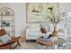 Bright and modern living room with stylish decor, comfortable seating, and wood floors at 523 S West St # 404, Raleigh, NC 27601