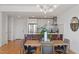 Open concept kitchen and dining area with wood floors and modern lighting at 523 S West St # 404, Raleigh, NC 27601