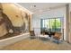Stylish lobby with comfortable seating and a large modern art piece, creating a welcoming atmosphere at 523 S West St # 404, Raleigh, NC 27601