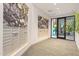 Apartment lobby with wall art, mailboxes, and exercise room entrance at 523 S West St # 404, Raleigh, NC 27601
