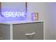 Bright neon sign adds character to this home at 5312 Woodsdale Rd, Raleigh, NC 27606