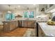 Spacious kitchen with stainless steel appliances, ample cabinet space, and natural light at 5312 Woodsdale Rd, Raleigh, NC 27606