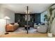 Stylish living room features built-in storage, modern lighting, and comfortable seating arrangements at 5312 Woodsdale Rd, Raleigh, NC 27606