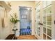Stylish mudroom features unique tile flooring, shiplap walls, and convenient storage solutions at 5312 Woodsdale Rd, Raleigh, NC 27606