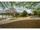 A view of the park buildings from the lakeside, showing the lovely location at 5312 Woodsdale Rd, Raleigh, NC 27606
