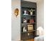 Built-in shelving showcases decorative items and recessed lighting at 5312 Woodsdale Rd, Raleigh, NC 27606