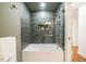 Shower boasts tiled surround, glass partition and built in niche at 5312 Woodsdale Rd, Raleigh, NC 27606