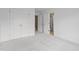 Empty bedroom featuring plush carpet, neutral walls, and a large closet at 5408 Colonial Oaks Dr, Apex, NC 27539