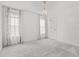 Bright bedroom featuring neutral walls, carpet and plenty of natural light from large windows at 5408 Colonial Oaks Dr, Apex, NC 27539