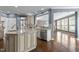 Open concept kitchen with stainless steel appliances, granite countertops, and hardwood flooring at 5408 Colonial Oaks Dr, Apex, NC 27539