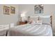 Serene bedroom featuring a plush quilt, and a calming neutral color palette at 5733 Mizuno Dr, Fuquay Varina, NC 27526