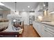 Well-equipped kitchen features stainless steel appliances, granite countertops, and ample cabinet space at 5733 Mizuno Dr, Fuquay Varina, NC 27526